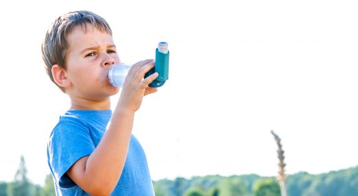 Blue using a blue inhaler with a spacer outside